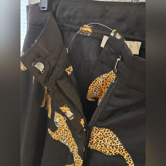 Stylish black wide-leg pants. Features a bold leopard print. - Picture 9 of 15